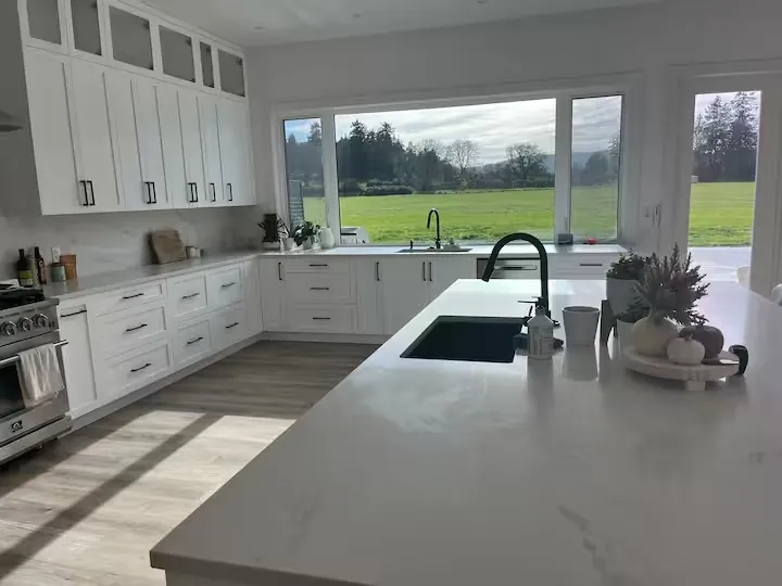 Modern Farm Oasis smart home — chef's kitchen with island seating for twelve